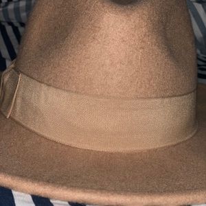 Almost new adjustable brim hat.
